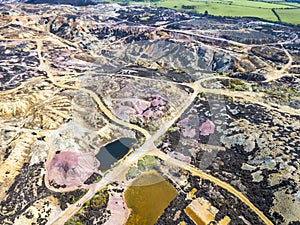 The colourful remains of the former copper mine Parys Mountain near Amlwch on the Isle of Anglesey, Wales, UK