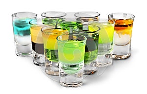 Colourful shot drinks on a white background with photo