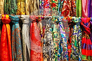 Colourful silk scarfs at a market stall