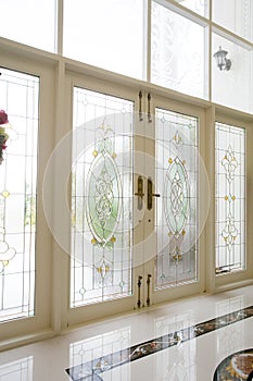 Colourful stained glass wooden door of a traditional