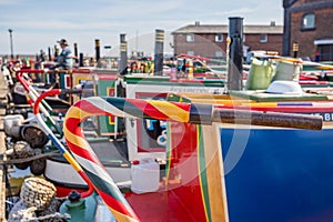 Colourful steering tillers on narrow boats photo