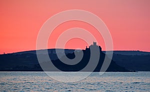 Colourful sunrise over St Michael`s Mount Cornwall