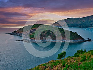 Colourful sunset over Phuket Beach at Promthep Cape Phuket Thailand