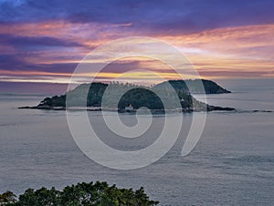 Colourful sunset over Phuket Beach at Promthep Cape Phuket Thailand