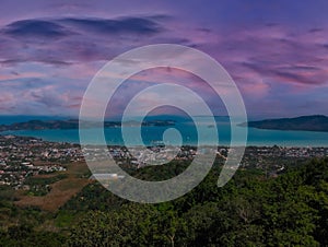 Colourful sunset over Phuket Beach at Promthep Cape Phuket Thailand