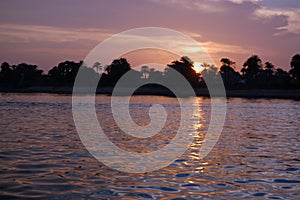 Colourful sunset over the River Nile, Luxor, Egypt