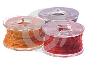 Colourful Thread Bobbins Macro Isolated