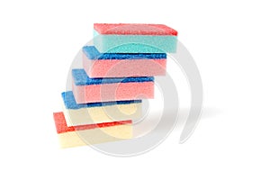 Colourful tower of kitchen scourers.