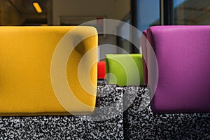 Colourful train headrests