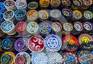 A colourful variety of plates and bowls on display at the Spice Bazaar in Istanbul in Turkey. photo