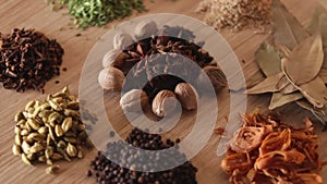 Colourful various herbs and spices for cooking,Cumin, black pepper, cloves, cardamom, fennel, bay leaf,Garam masala, Mace, Javitri