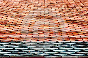 Colourful vinatge ceramic tiles roof of Wat Phra Mahathat Nakhon Si Thammarat, Thailand