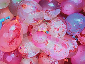 Colourful water balloons and natural colours