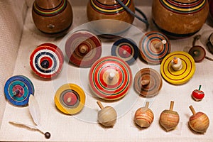 Colourful wooden Japanese tops display in museum of Shiroi Koibito Park at Sapporo in Hokaido, Japan