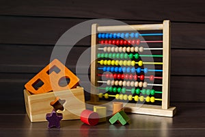 Colourful Wooden Toy on Wooden Background, Kindergarten Geometrics Shape for Creative and Educate Development