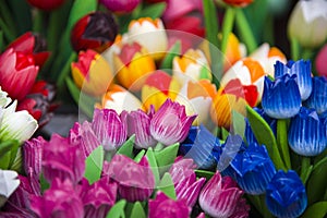 Colourful wooden tulips in amsterdam flower market