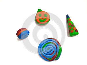 Colourfull playdoh on white background