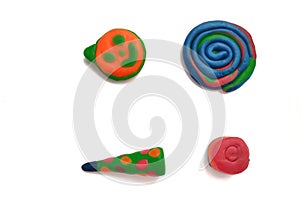 Colourfull playdoh on white background photo