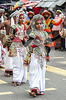 Colourfully dressed dancers perform during the Hikkaduwa Perahara on the west coast of Sri Lanka.