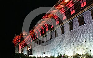 Colourfully lit walls of Thimphu Dzong, Thimphu, Bhutan.