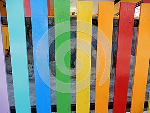 Colourfully painted fence