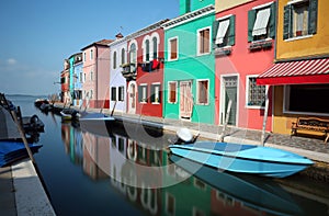 Colourfully painted houses on Burano Island near Venice in Italy photo