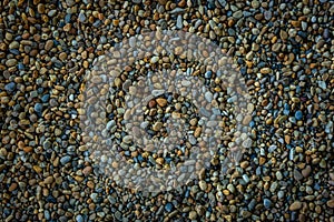 Colourul rolled river gravel background abstract