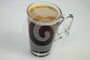 A columbian coffee in a glass cup