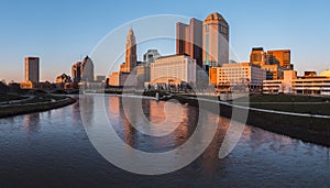 Columbus Ohio skyline at John W. Galbreath Bicentennial Park at orange dusk