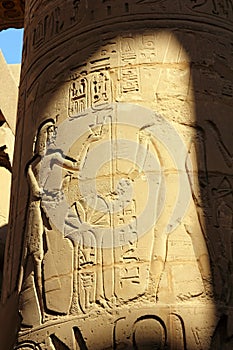 Column with ancient egypt images and hieroglyphics