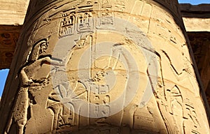 Column with ancient egypt images and hieroglyphics