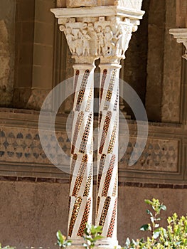 Column with Byzantine mosaics in the cloister of Monreale Cathedral, Sicily.