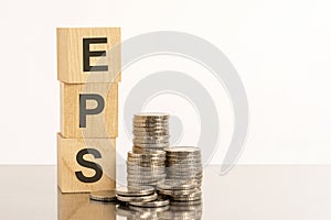 Column of cubes with abbreviation EPS - Earnings Per Share