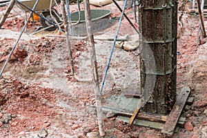 Column formwork Internal steel structure Made up of poles from the ground. Column timber form work and reinforcement bar at the co