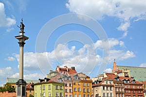 Column of the king Sigismund III against the background of historical buildings. Warsaw, Poland