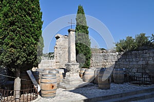 Column with old wooden barrels in the town of Les Baux de Provence in France