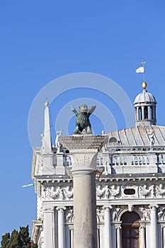 Column of San Marco and National Library of St Mark`s on Piazza San Marco , Venice, Italy.