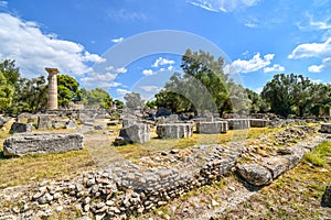 A column stands among the ancient ruins near the site of the original Temple of Zeus, in Olympia Greece.