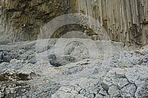 Columnar basalt rock, Cape Stolbchaty on Kunashir Island, in the foreground bases of lava basalt columns form a kind of pavement photo