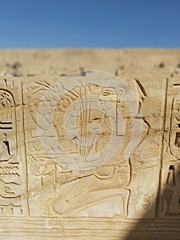 Wall at ancient Egyptian temple of Medinat Habu in Luxor