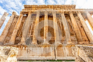 Columns of ancient Roman temple of Bacchus and blue sky in the background, Beqaa Valley, Baalbeck, Lebanon