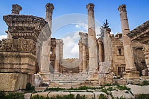 Columns with decorative ornaments in the ancient roman city ruins of Jerash