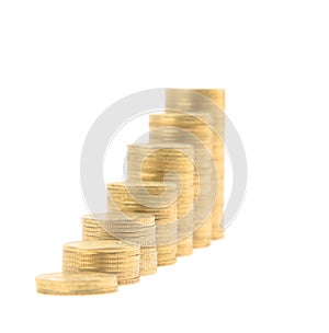 Columns of golden coins isolated