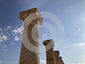 Columns of the House of Theseus, Roman villa ruins at Kato Paphos Archaeological Park in the sky background