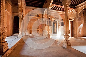 Columns inside the carved historical rooms of mansion