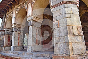 Columns of Isa Khan`s tomb in the city of Delhi photo