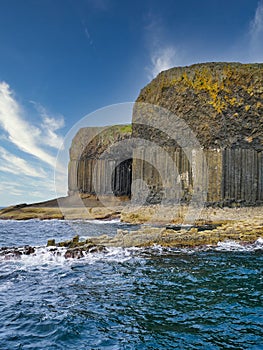 Columns of jointed volcanic basalt rocks on the island of Staffa in the Inner Hebrides, Scotland