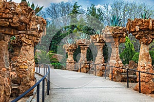 Columns in Park Guell designed by Antoni Gaudi in Barcelona, Spain