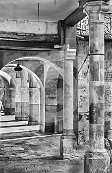 Columns in Plaza Mayor in Salamanca, black and white photo