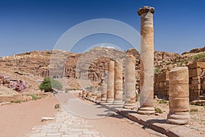 Columns at roman paved road to Qasr al Bint temple, in Petra Archaeological Park, Jordan